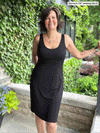 Miik founder Donna (five feet six, small) showing the both sides of Miik's Maryse reversible sweetheart dress in black. The gif shows Donna wearing the dress reversed 