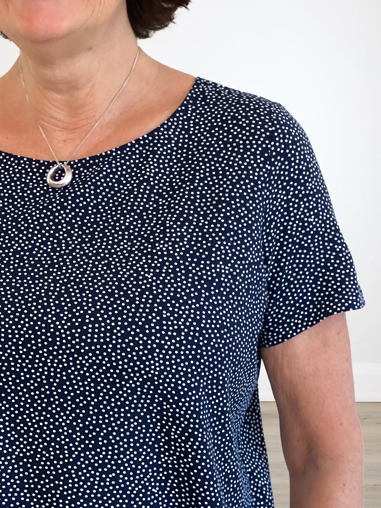 A closeup shot image of the neckline of Miik&