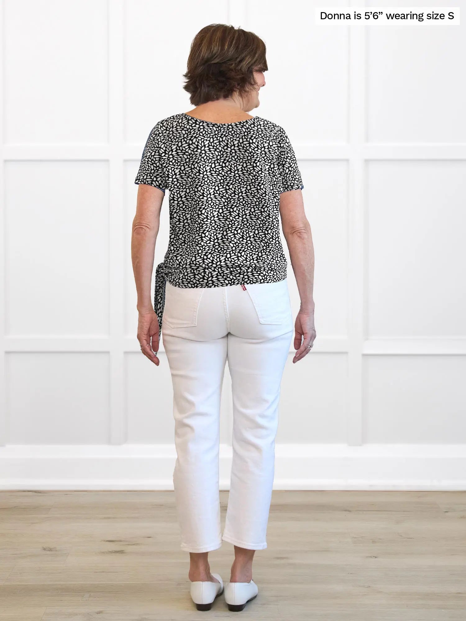Miik founder Donna (5’6”, small) standing with her back towards the camera showing the back of Miik&