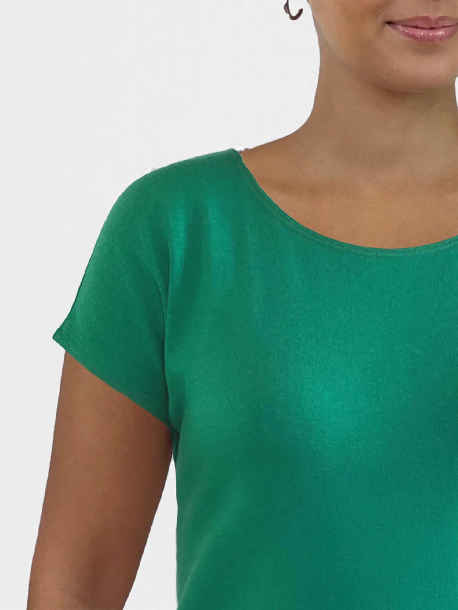 A closeup image of the neckline of f Miik&