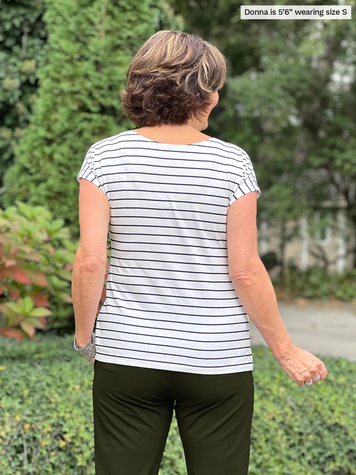 Miik founder Donna (5’6”, small) standing with her back towards the camera showing the back of Miik&