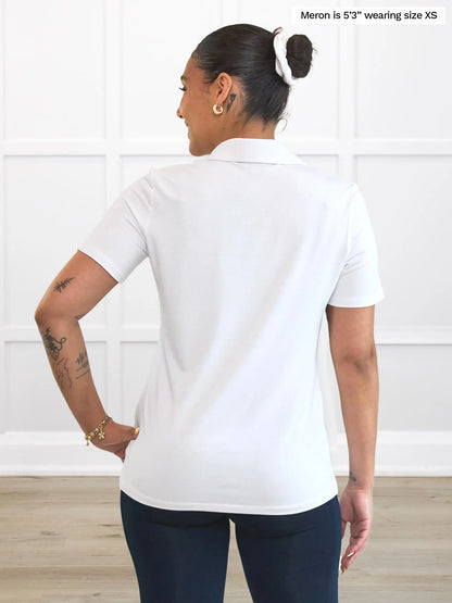 Miik model Meron (5’3”, xsmall) standing with her back towards the camera showing the back of Miik&