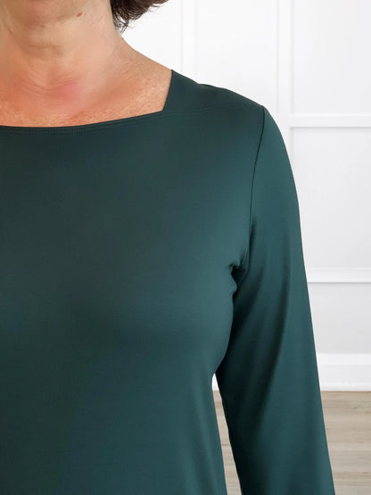 A closeup detail shot of the neckline of Miik&