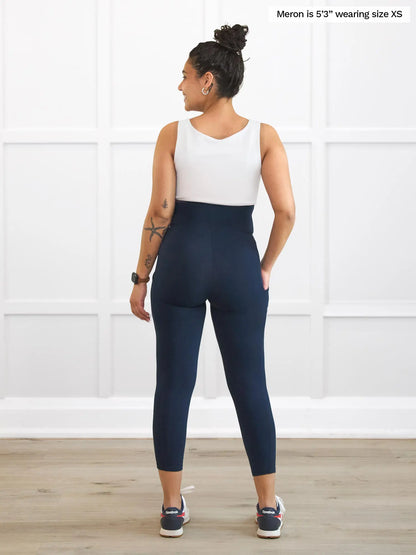 Miik model Meron (5’3”, xsmall) standing with her back towards the camera showing the back of Miik&