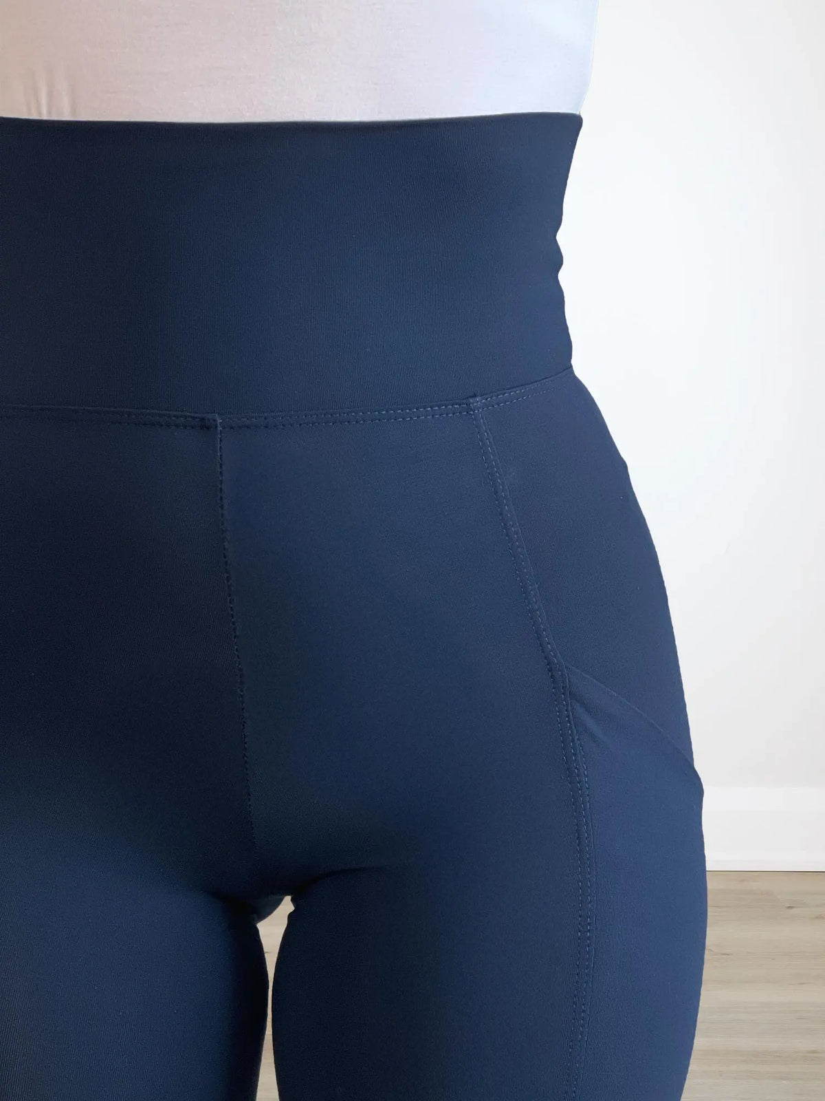 A close up image of the waistband and pocket of Miik&