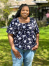 Miik model plus size Kimesha (58", 3x) smiling wearing Miik&