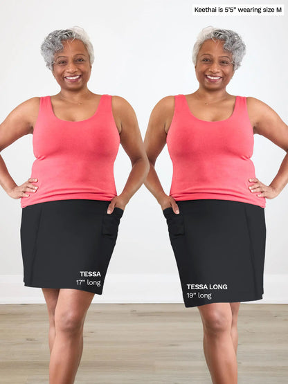 Woman modeling side by side images of the Tessa high waisted pocket skort in black, in regular vs. long
