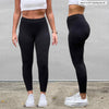 Miik model Meron (5'3", xsmall) wearing Miik's Tyson mid-rise fleece legging in black. The image is showing a close up front and side of the legging 