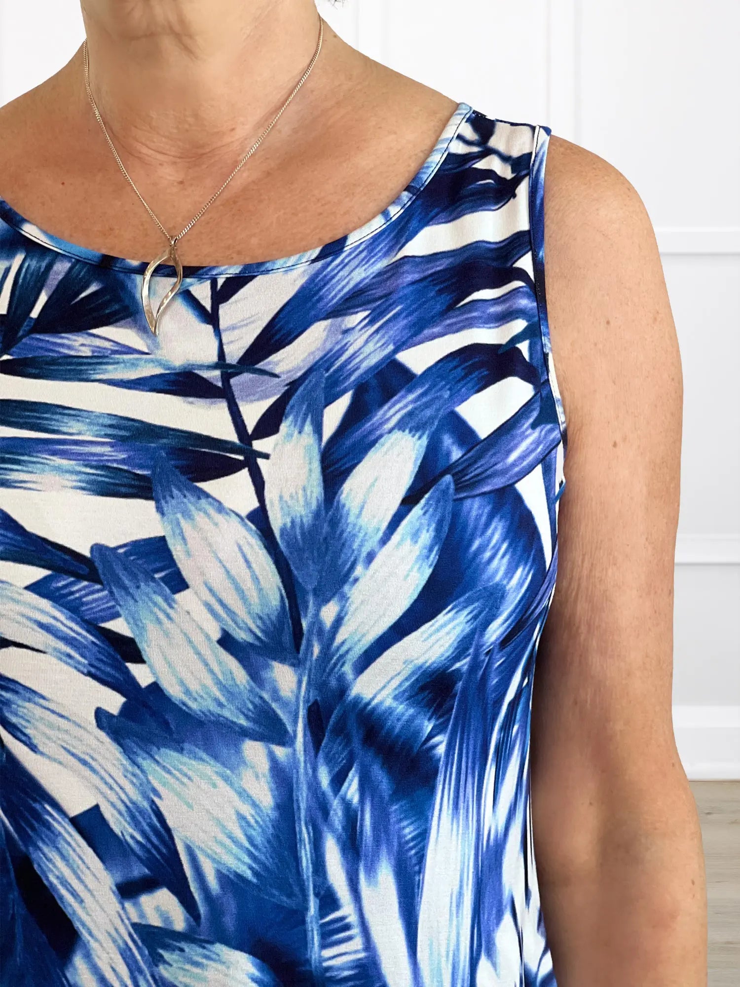 A closeup detail of the neckline of Miik&