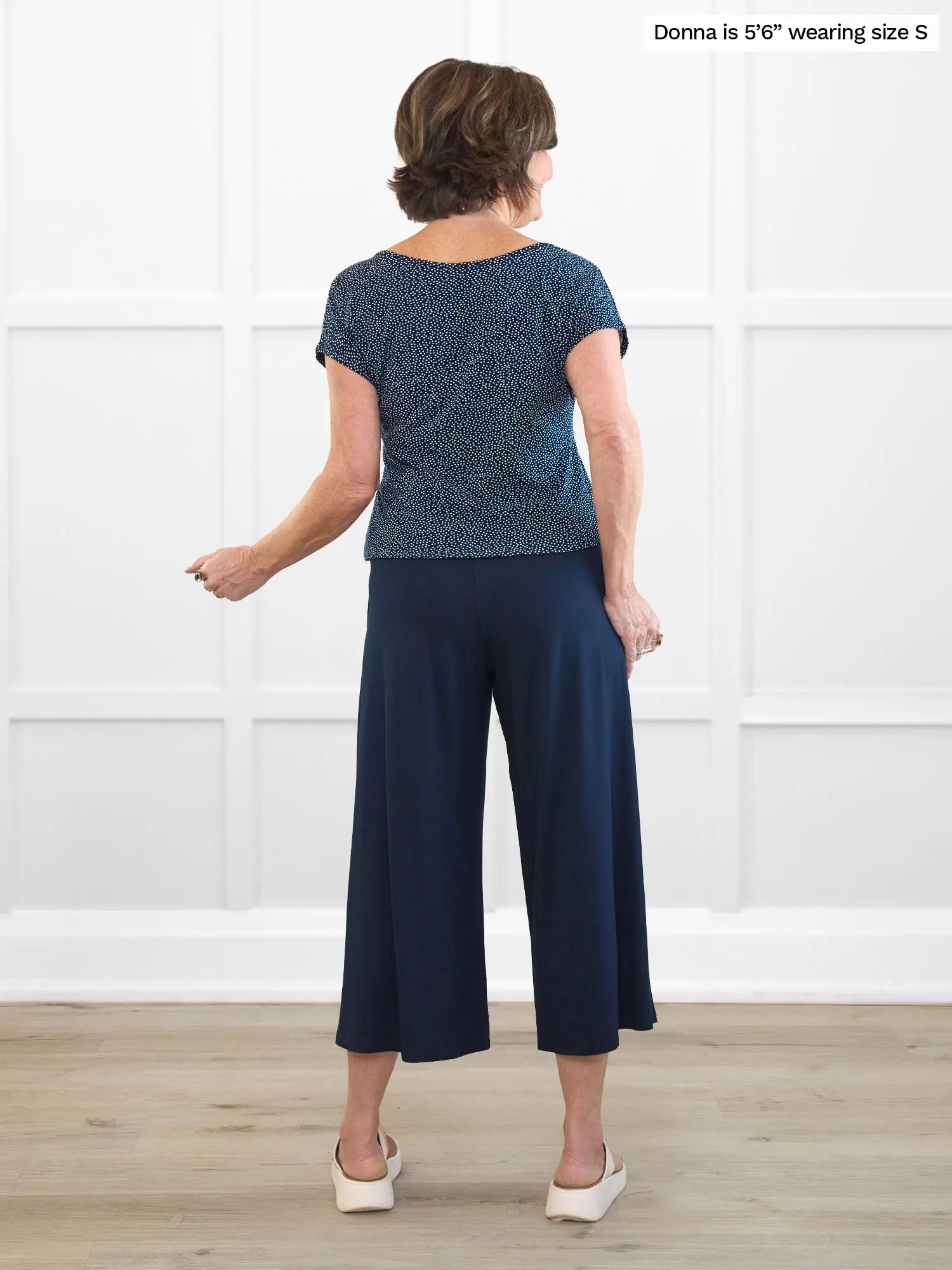 Miik founder Donna (5’6”, small) standing with her back towards the camera showing the back of Miik&
