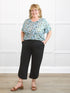 Akira tulip hem capri pant for women in Black on model Kelly, size 2X @Kelly-2X 