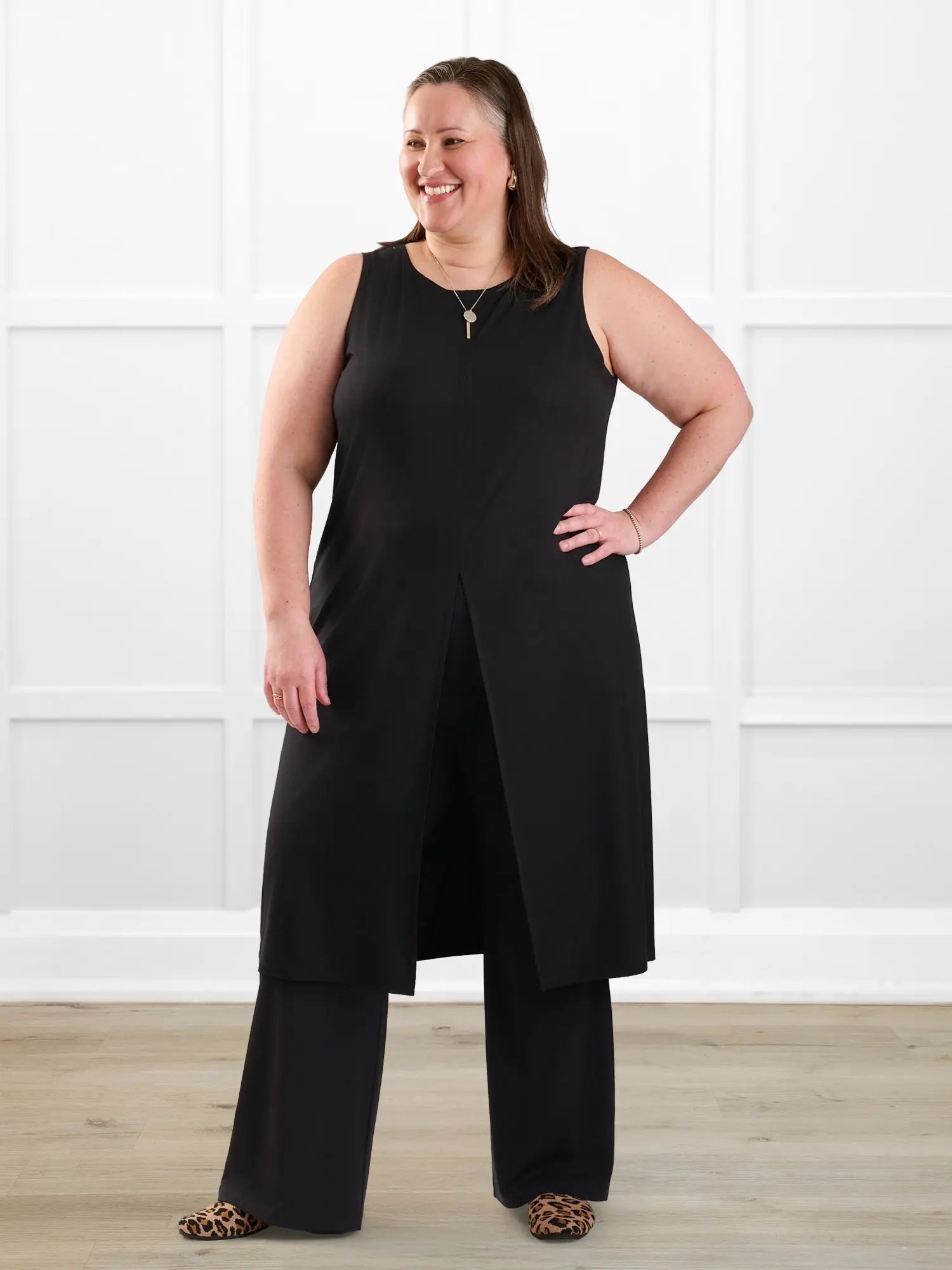 Alaya front slit sleeveless long tunic for women in Black on model Cristina, size XXL @Cristina-XXL 