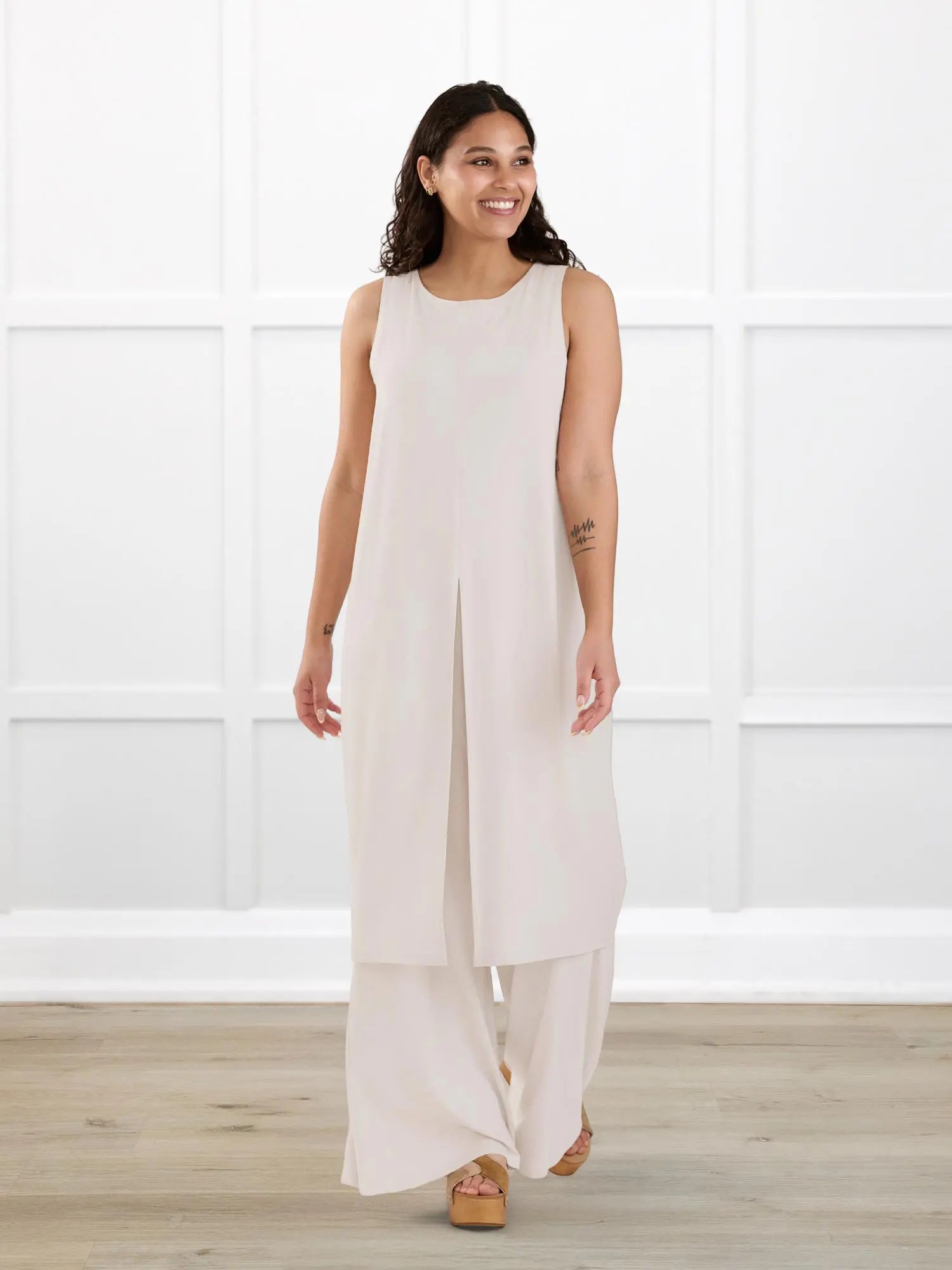 Alaya front slit sleeveless long tunic for women in Sandstone on model Meron, size XS @Meron-XS 