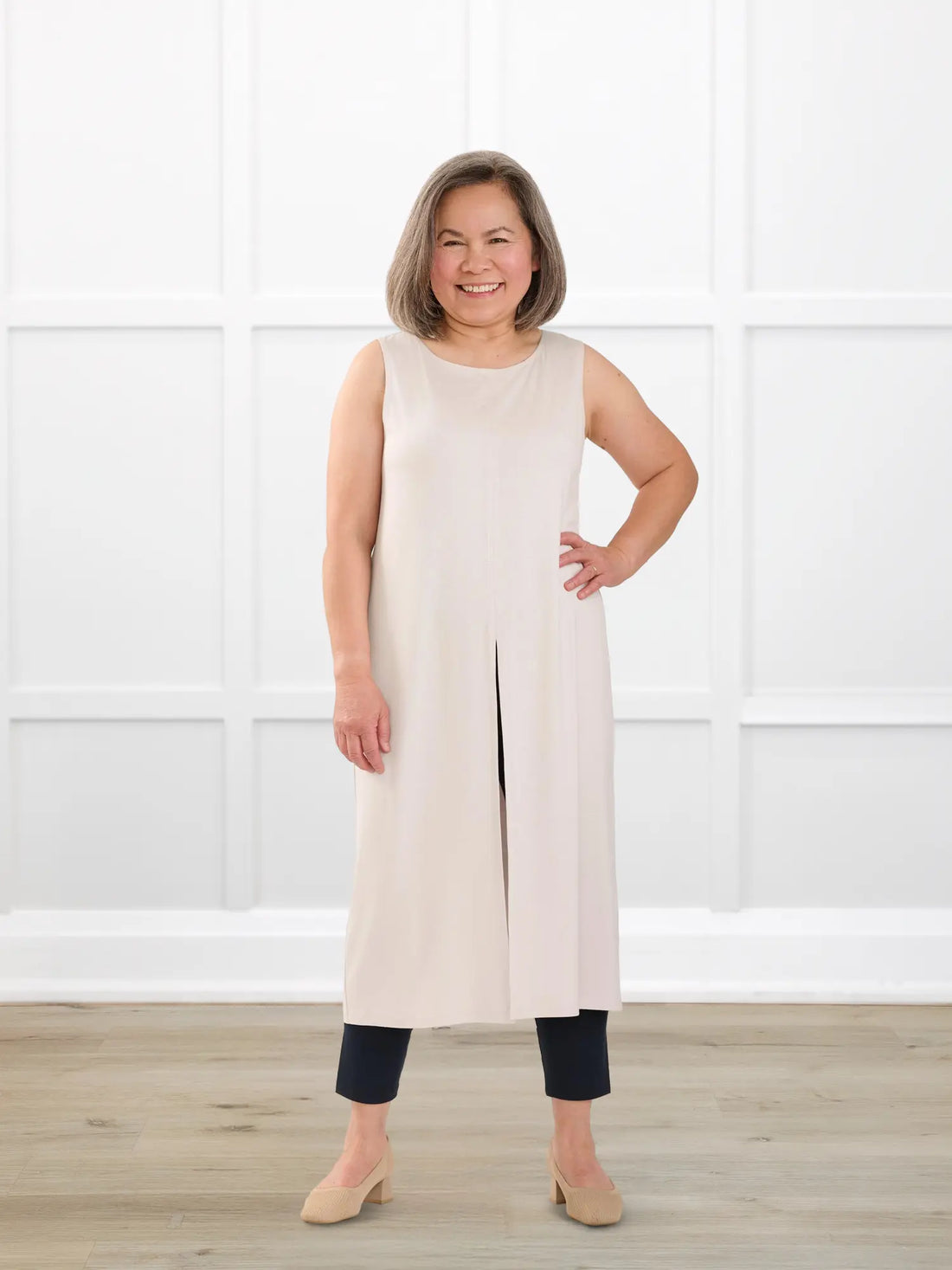 Alaya front slit sleeveless long tunic for women in Sandstone on model Terry, size S @Terry-S 