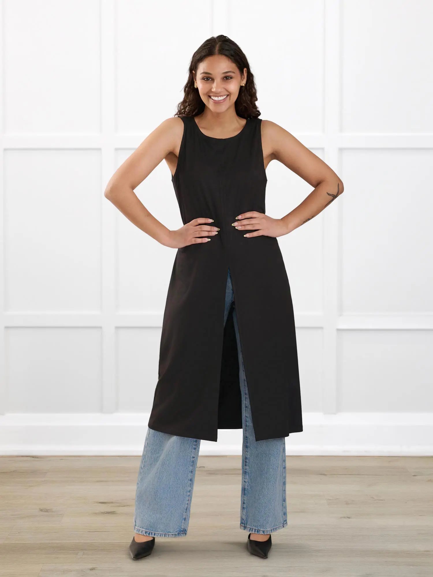 Alaya front slit sleeveless long tunic for women in Black on model Meron, size XS @Meron-XS 