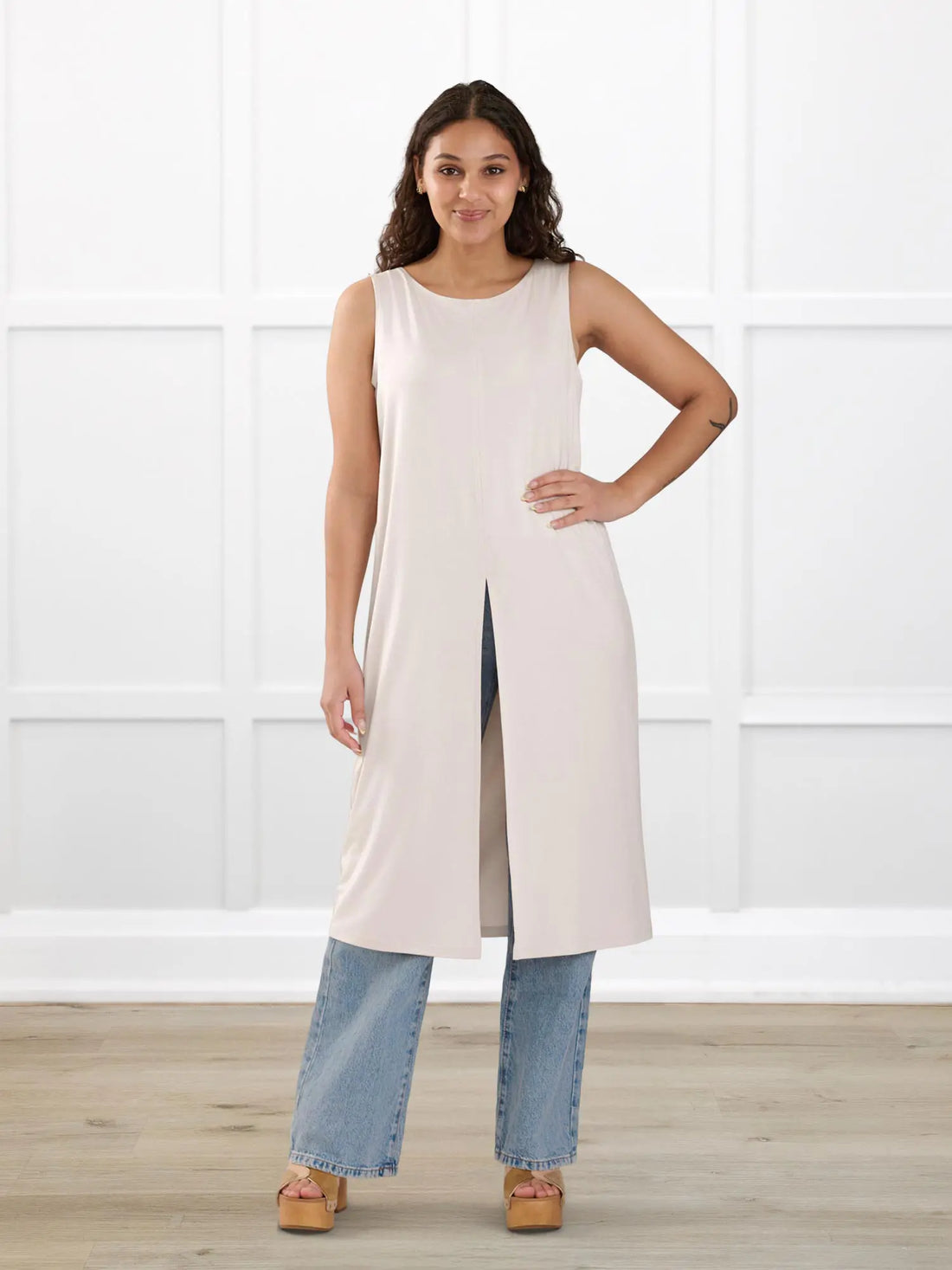 Alaya front slit sleeveless long tunic for women in Sandstone on model Meron, size XS @Meron-XS 