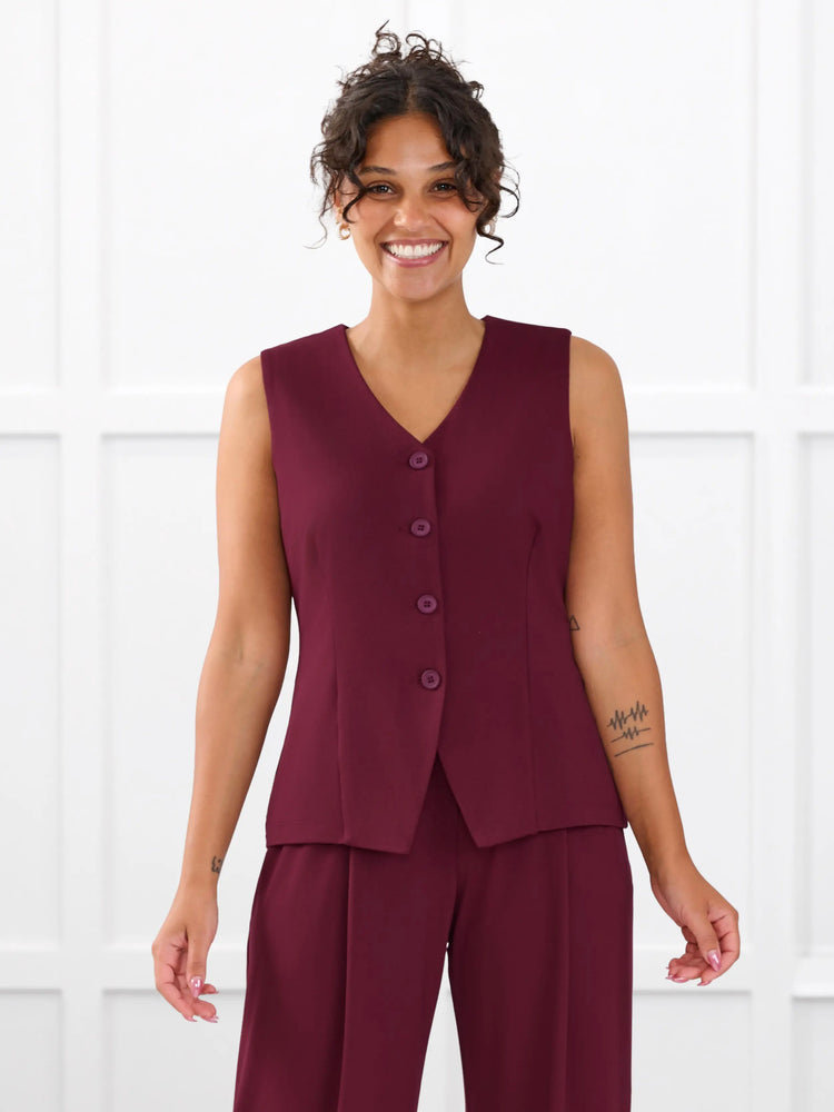 Alba tailored stretchy vest for women in Merlot on model Meron, size XS @Meron-XS 