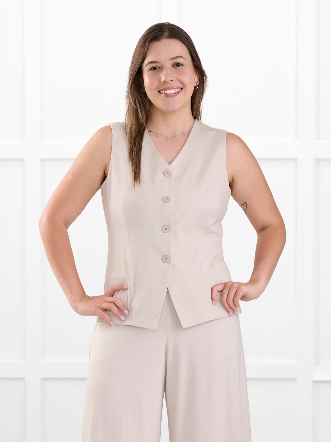 Alba tailored stretchy vest for women in Sandstone on model Christal, size S @Christal-S 