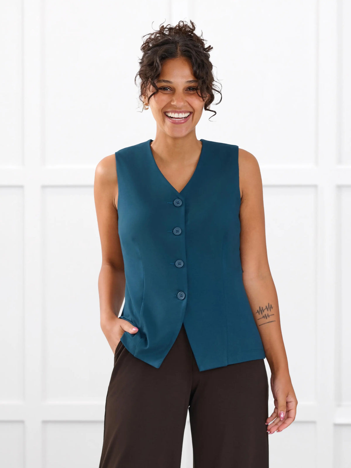 Alba tailored stretchy vest for women in Atlantic on model Meron, size XS @Meron-XS 