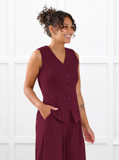 Alba tailored stretchy vest for women in Merlot on model Meron, size XS @Meron-XS 