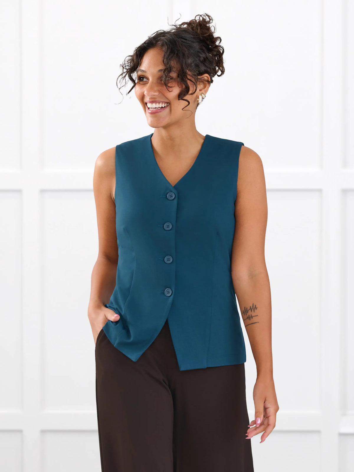 Alba tailored stretchy vest for women in Atlantic on model Meron, size XS @Meron-XS 