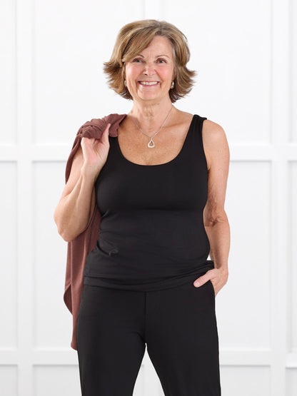 Amina reversible neckline shelf bra tank for women in Black on model Donna, size S @Donna-S 