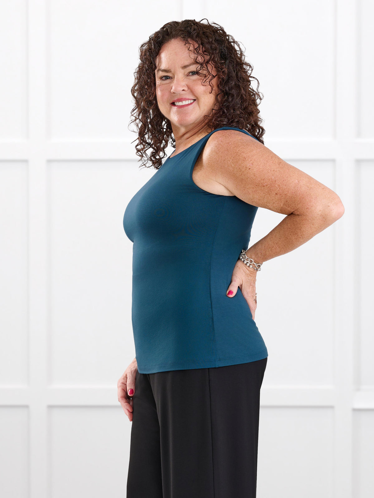 Amina reversible neckline shelf bra tank for women in Atlantic on model Kerri, size M @Kerri-M 