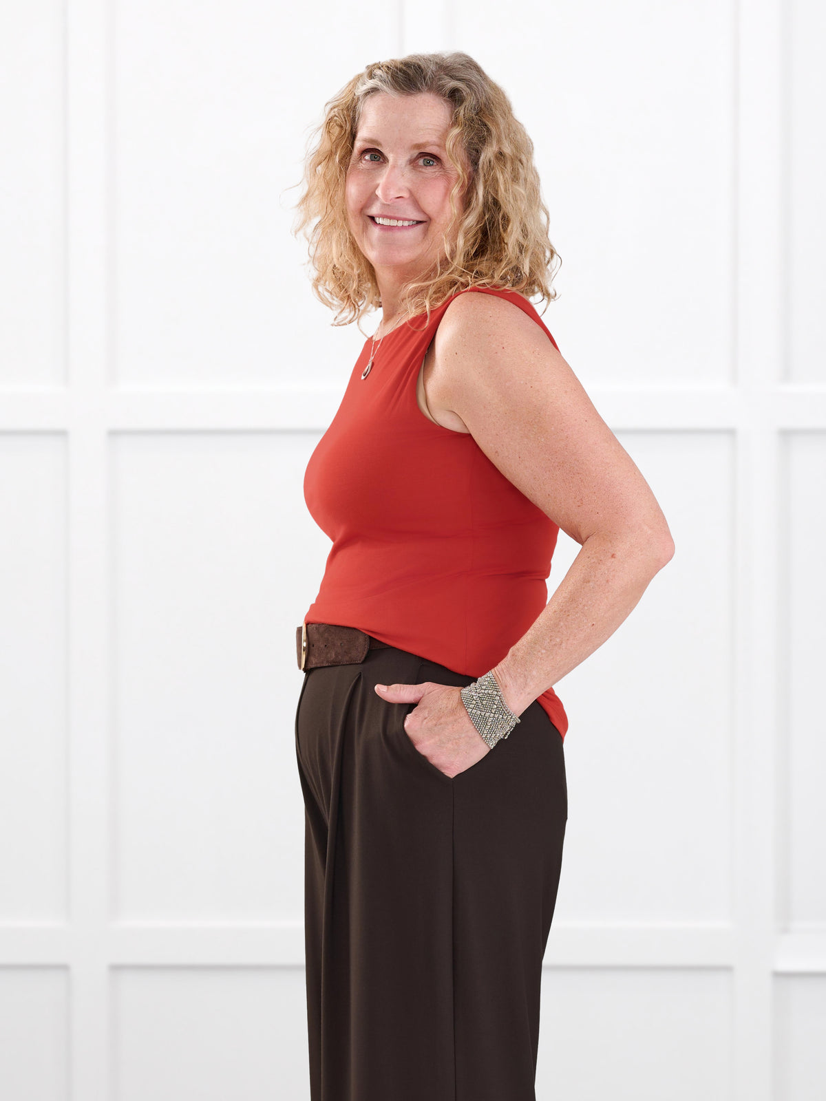 Amina reversible neckline shelf bra tank for women in Terracotta on model Carolyn, size L @Carolyn-L