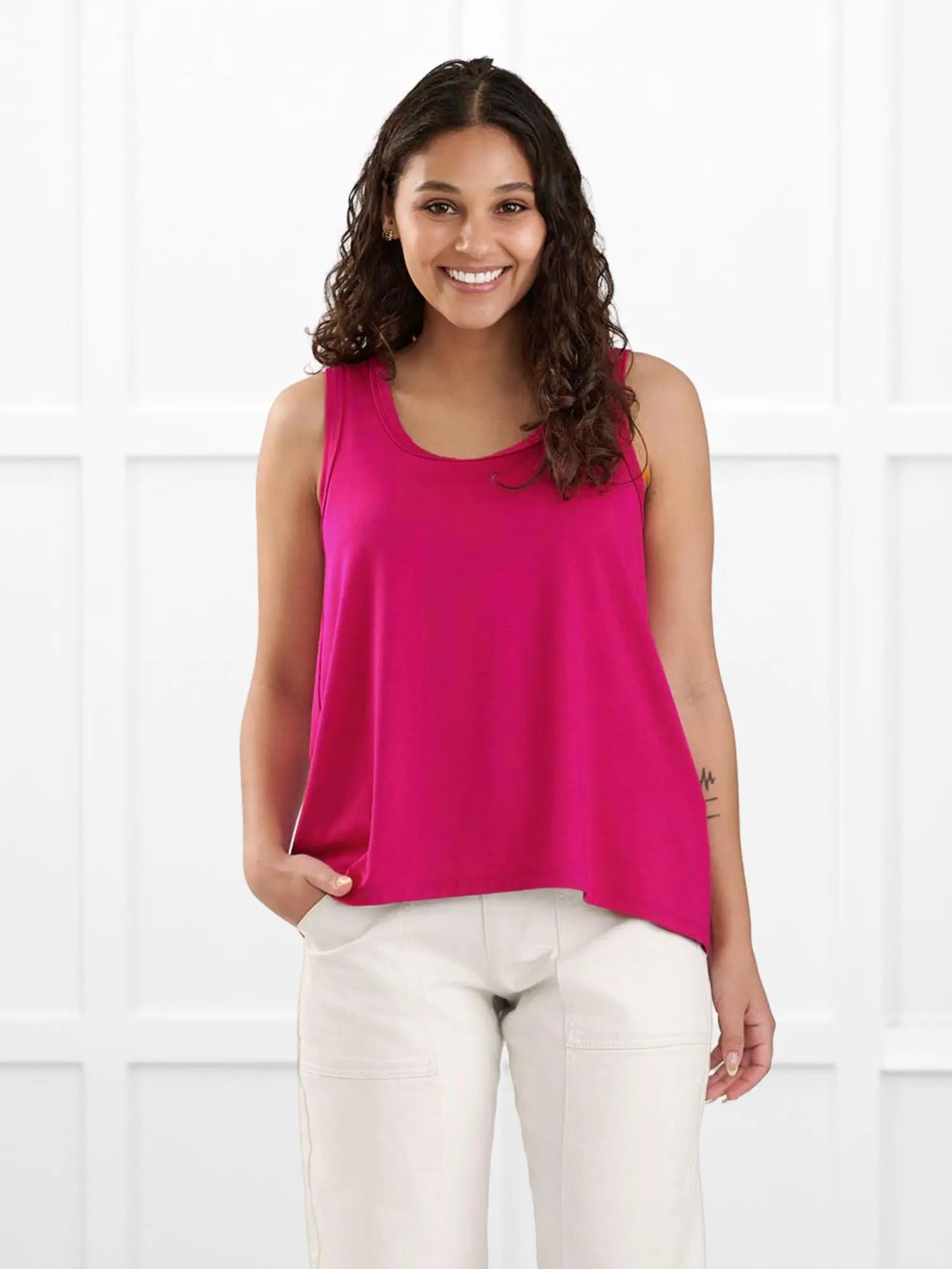 Anjuli flowy scoop neck tank for women in Dragon fruit on model Meron, size XS @Meron-XS 