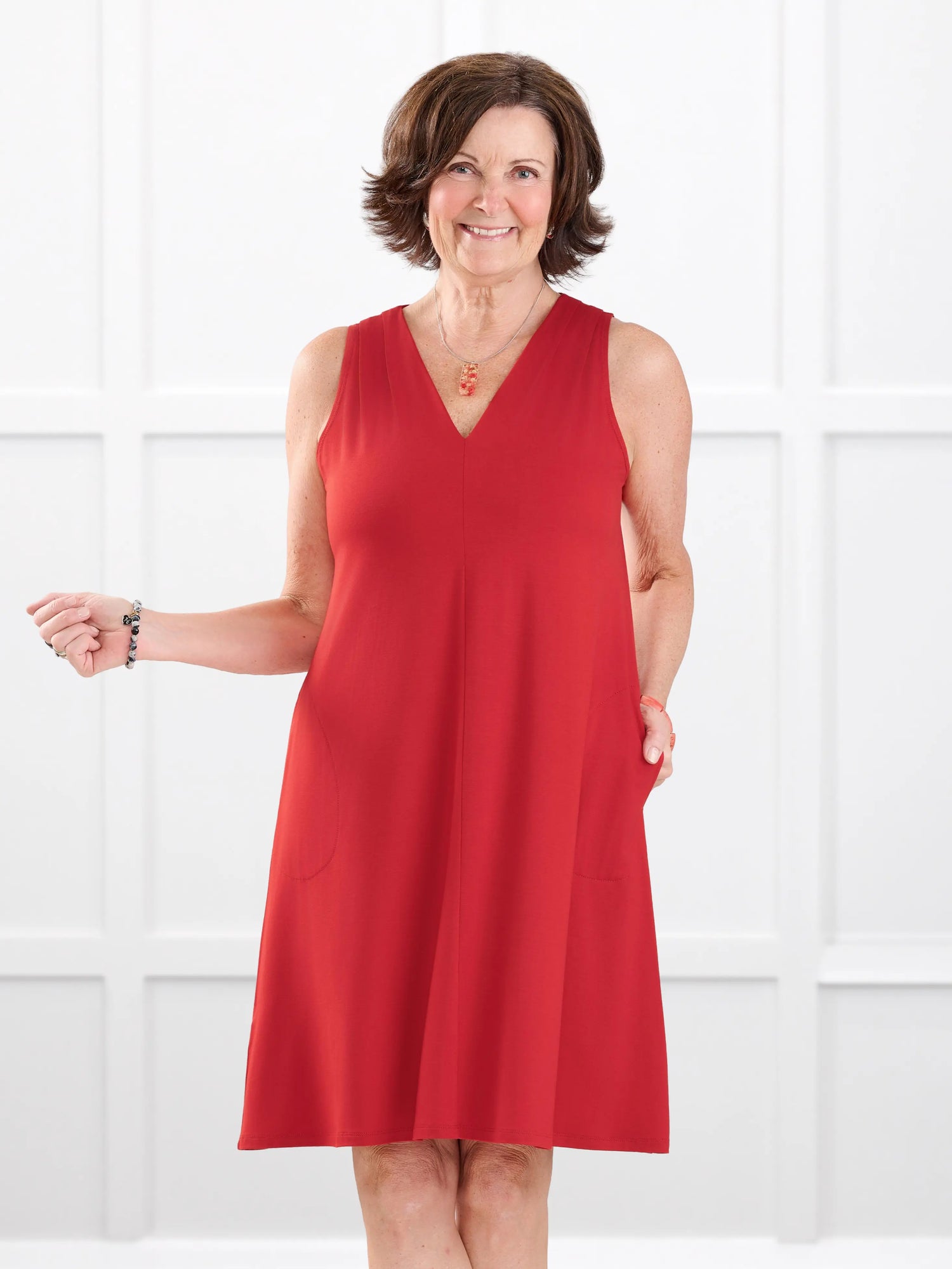 Bevlyn sleeveless v neck pocket dress in Chili on model Donna, size S @Donna-S 