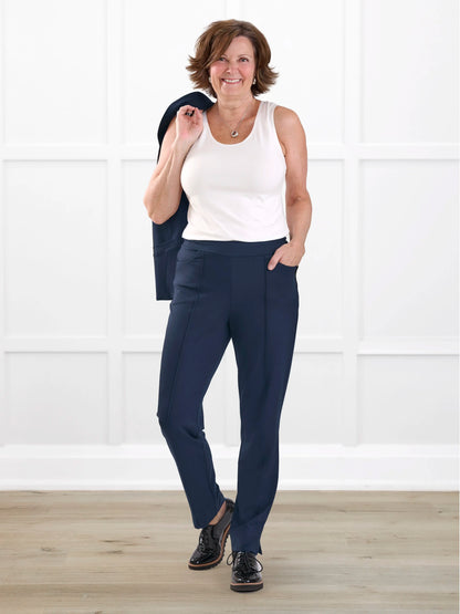 Christal pull on pintuck ankle pant in Navy on model Donna, size S Regular @Donna-S-regular 