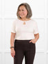 Darlene reversible neckline ruffle sleeve top for women in Natural on model Terry, size S @Terry-S 