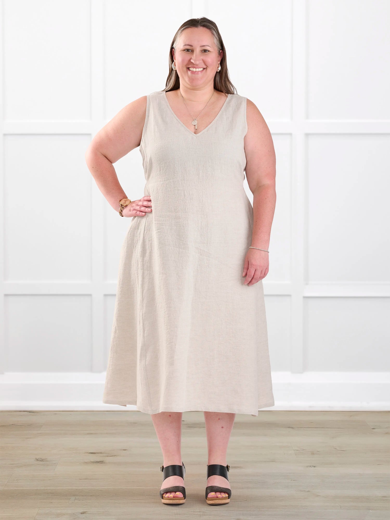 Delfina reversible neckline linen dress for women in Sand linen on model Cristina, size XXL @Cristina-XXL 