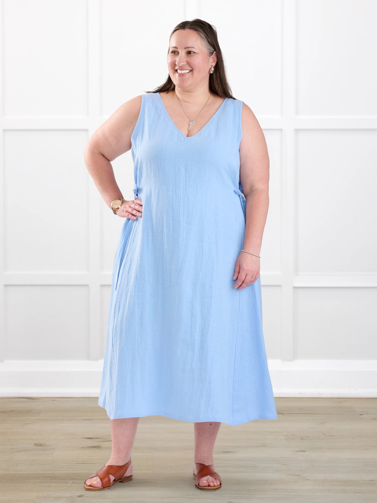 Delfina reversible neckline linen dress for women in Serene blue linen on model Cristina, size XXL @Cristina-XXL 