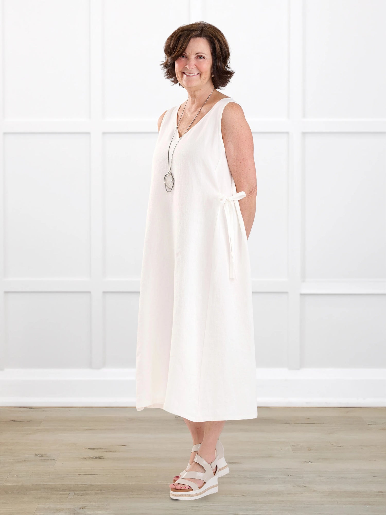 Delfina reversible neckline linen dress for women in Ivory linen on model Donna, size S @Donna-S 