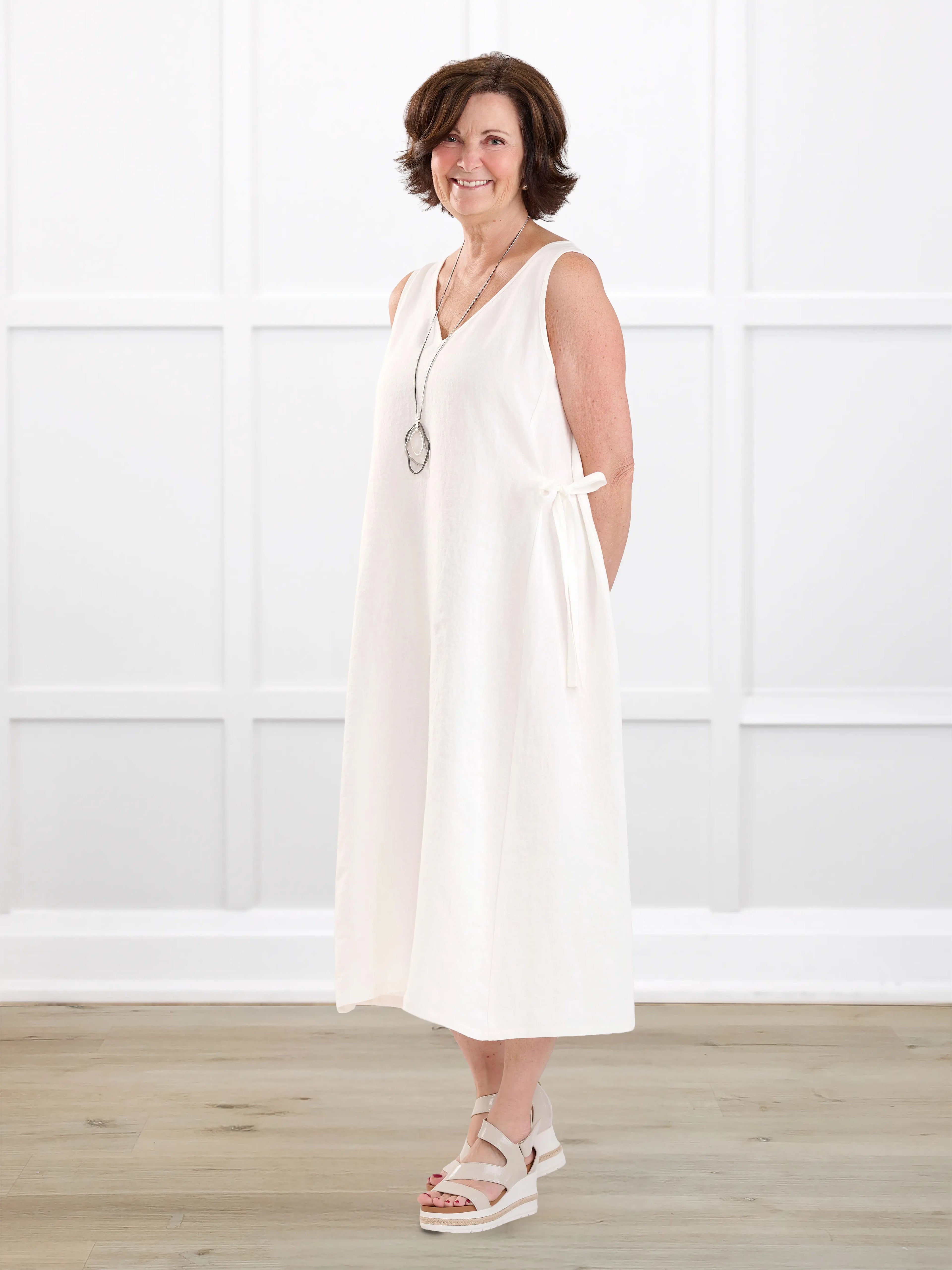 Delfina reversible neckline linen dress for women in Ivory linen on model Donna, size S @Donna-S 