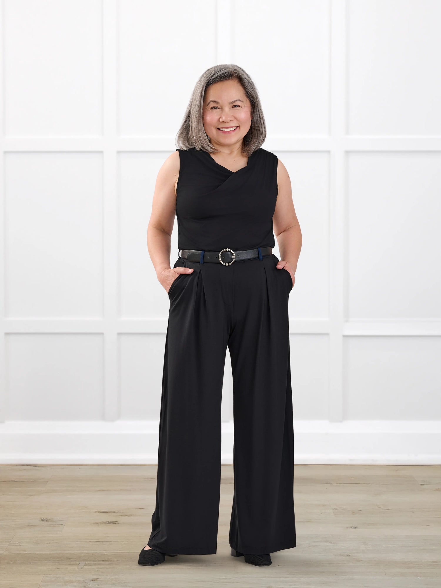 Dion sleeveless draped dressy top for women in Black on model Terry, size S @Terry-S 