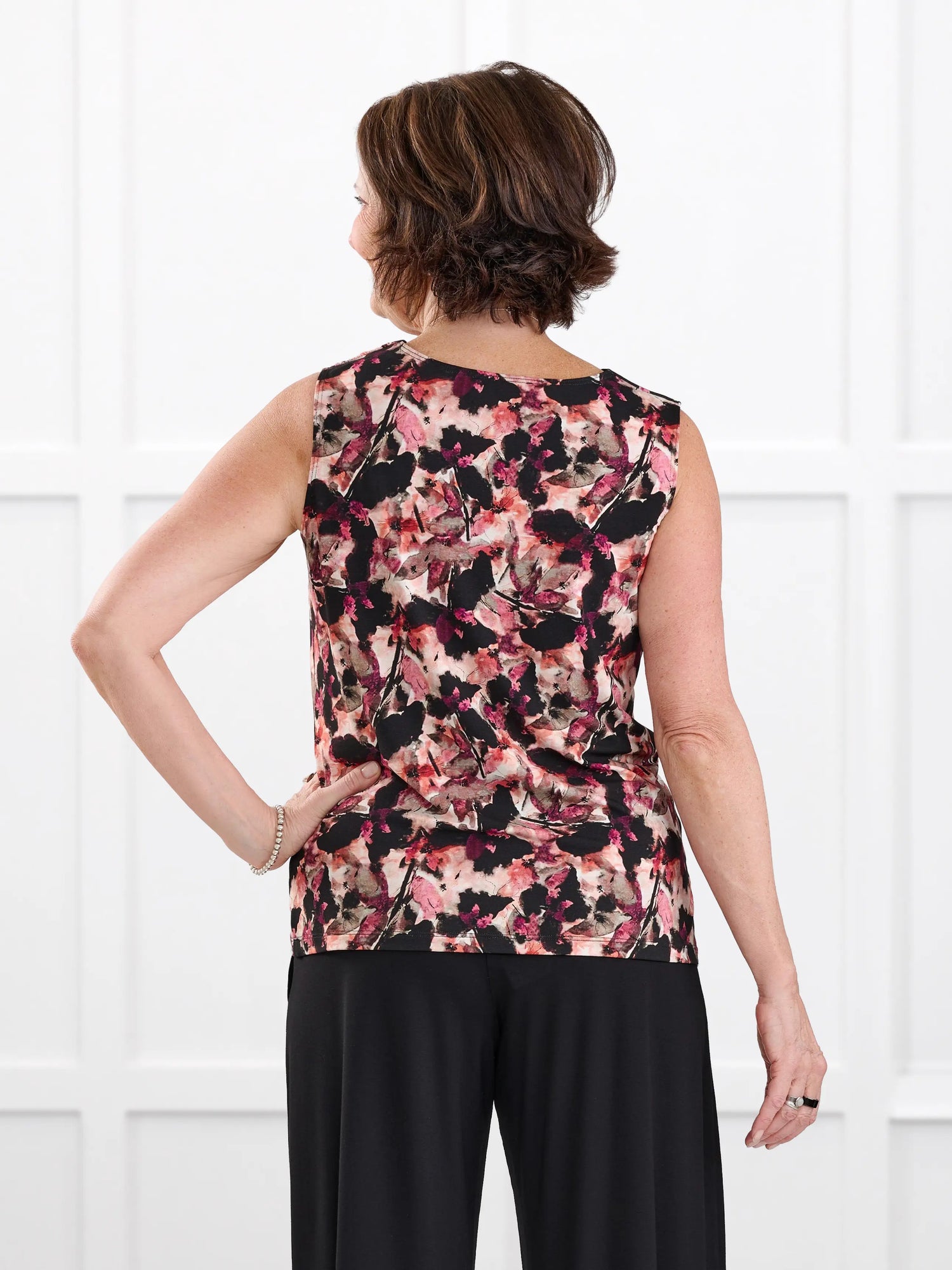 Dion sleeveless draped dressy top for women in Pink bouquet on model Donna, size S @Donna-S 