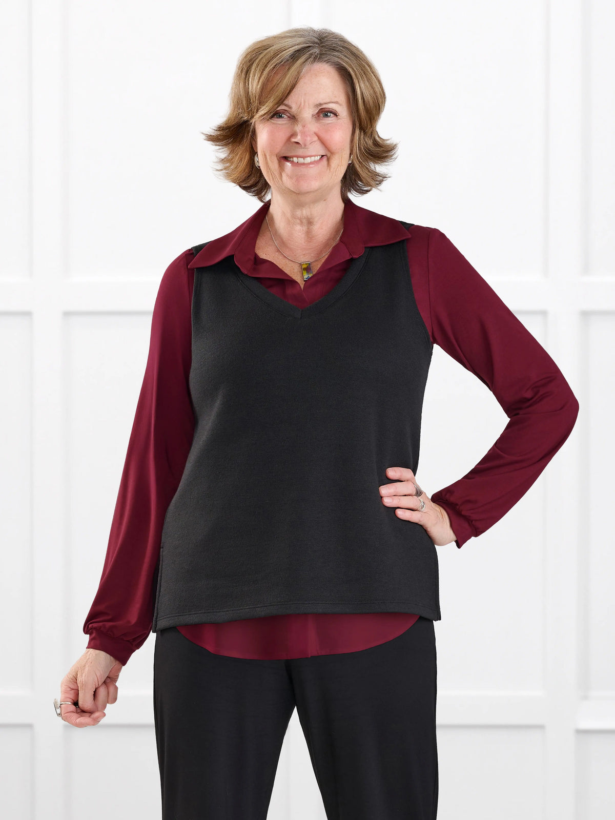 Dory v neck sweater vest for women in Black on model Donna, size S @Donna-S 
