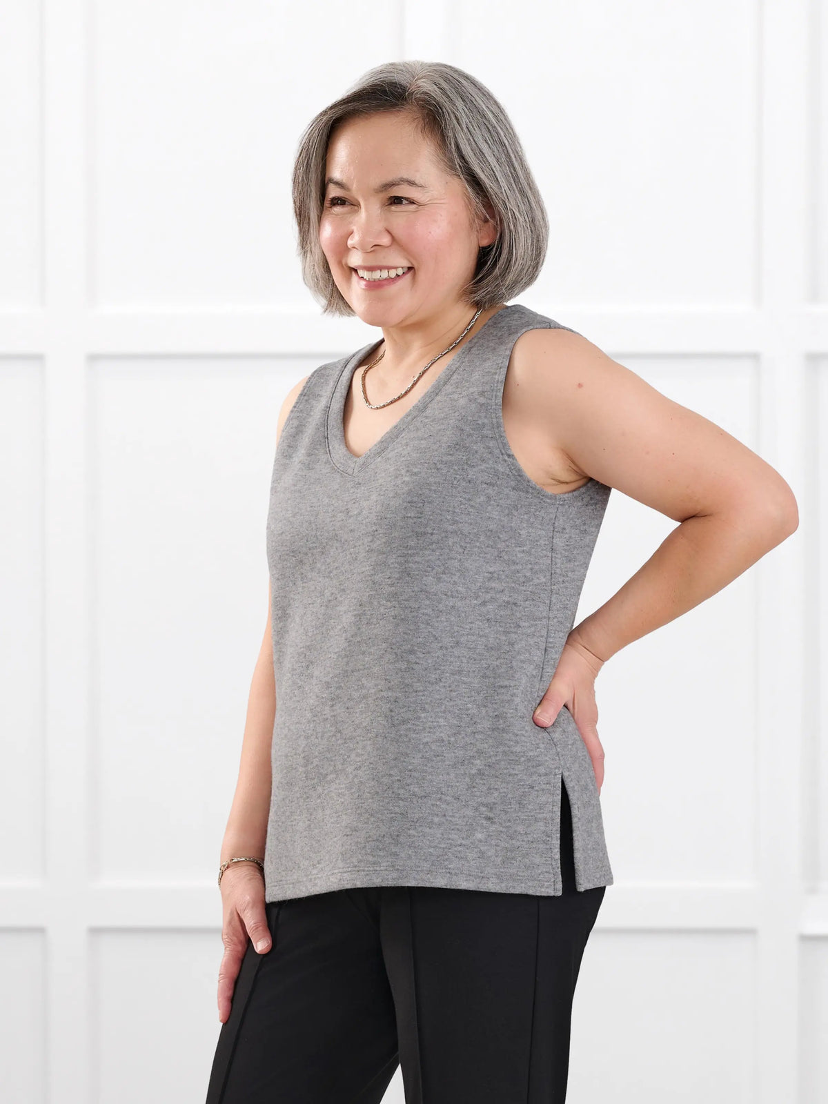 Dory v neck sweater vest for women in Heather grey on model Terry, size S @Terry-S 
