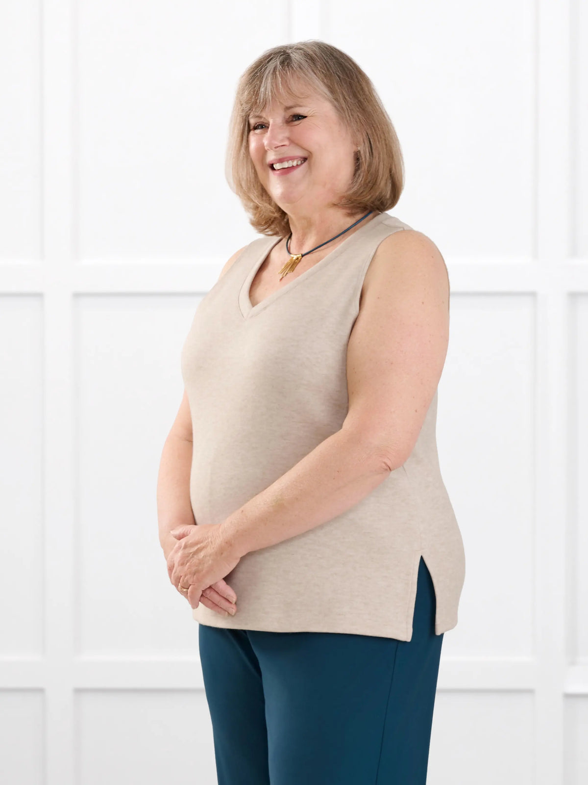 Dory v neck sweater vest for women in Oatmeal melange on model Laurie, size XXL @Laurie-XXL 