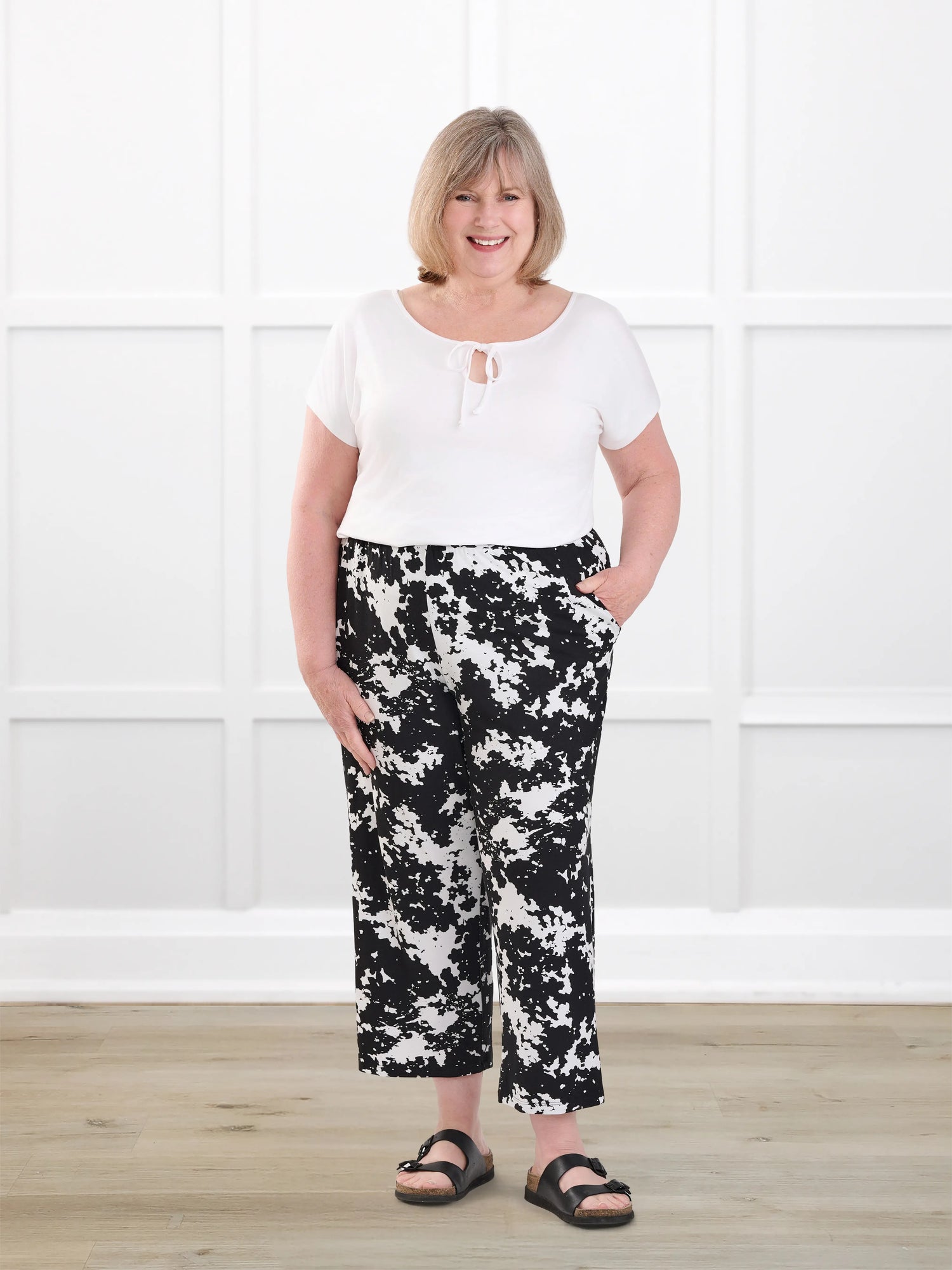 Easton pocket capri for women in Moo’d bloom on model Laurie, size XL @Laurie-XL 
