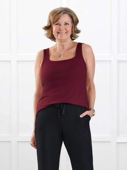 Eline reversible neckline shelf bra tank for women in Merlot on model Donna, size S @Donna-S 