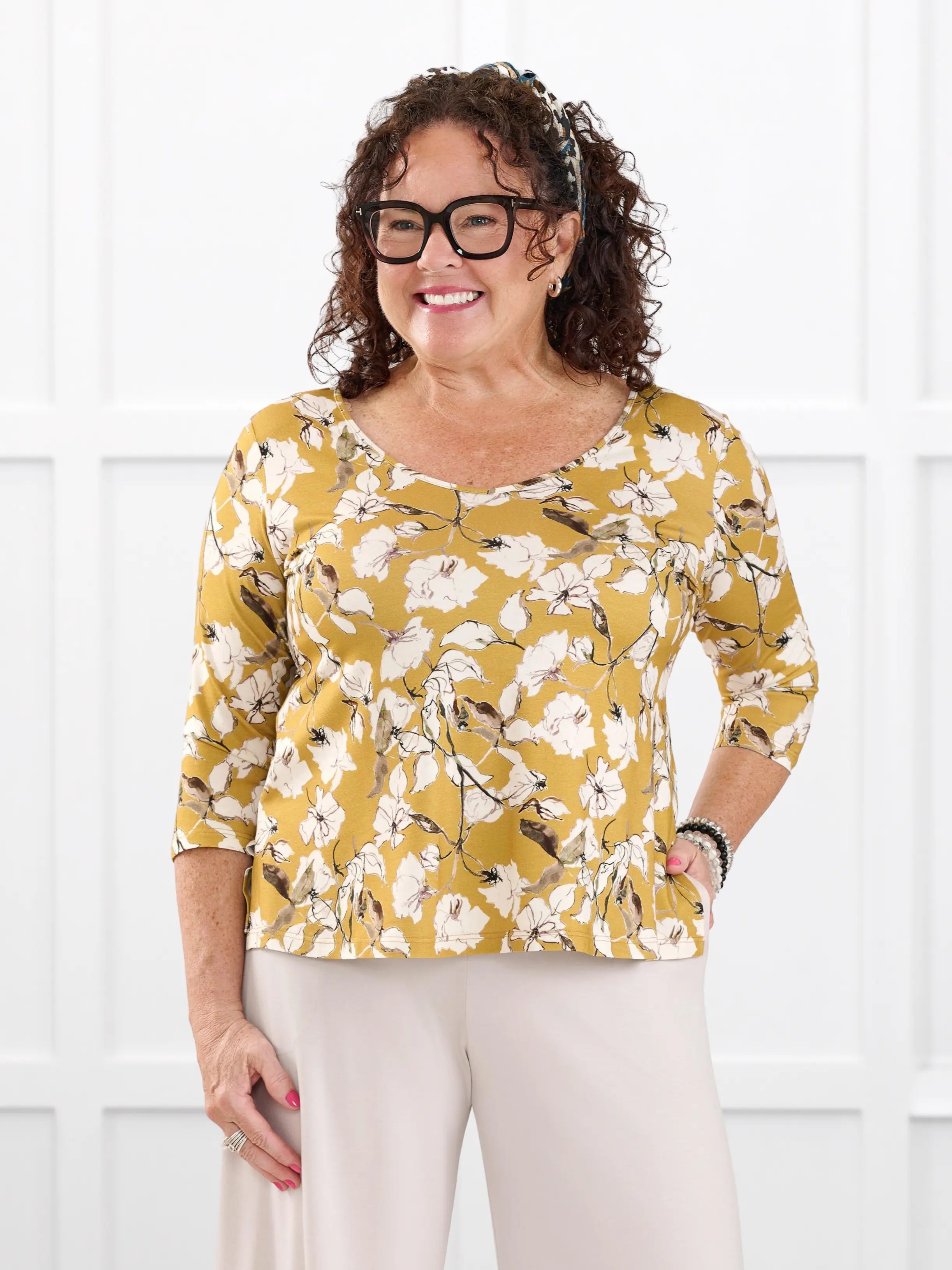Fran reversible neckline sleeve top for women in Amber bloom on model Kerri, size M @Kerri-M 