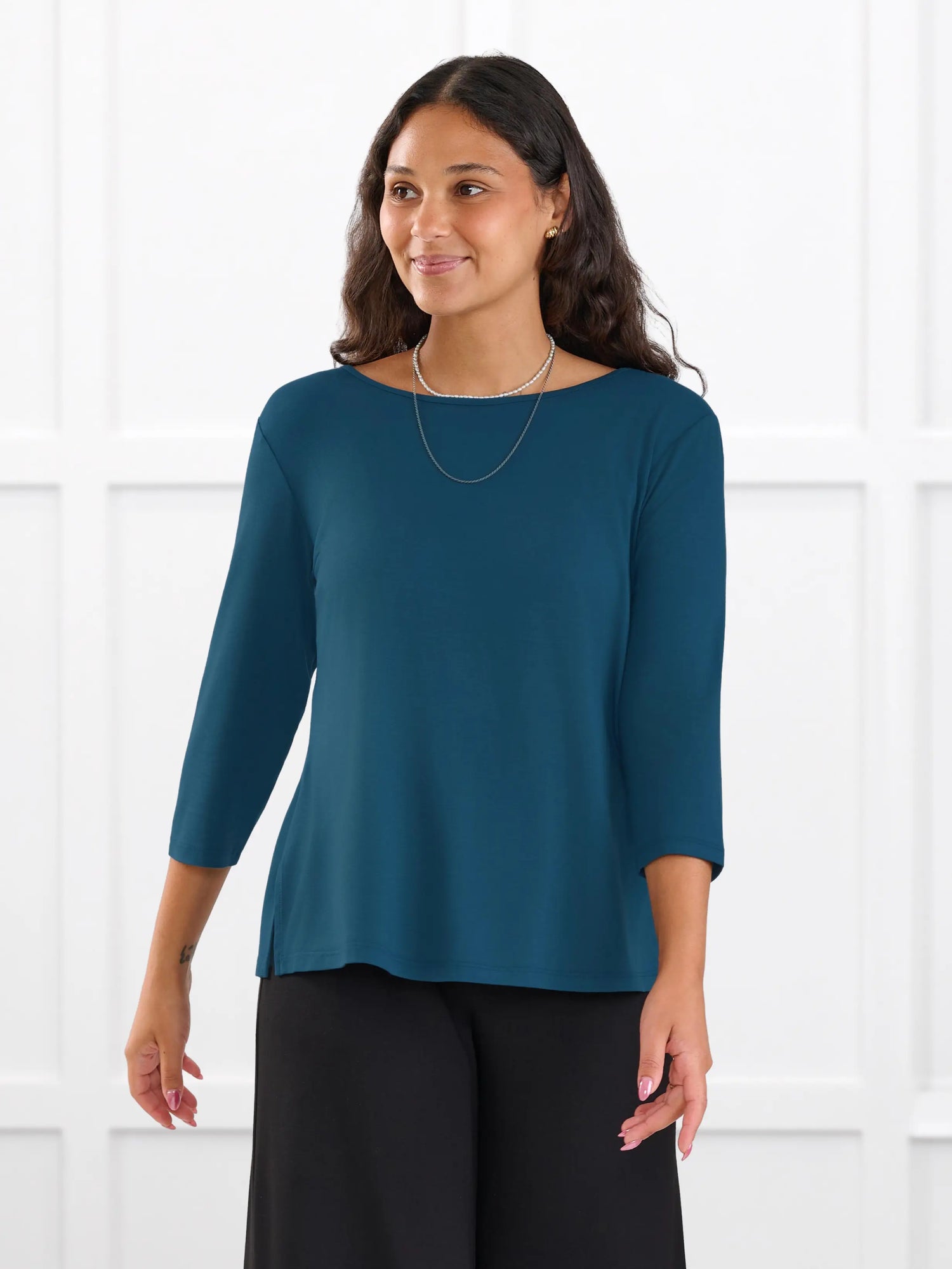 Fran reversible neckline sleeve top for women in Atlantic on model Meron, size XS @Meron-XS 