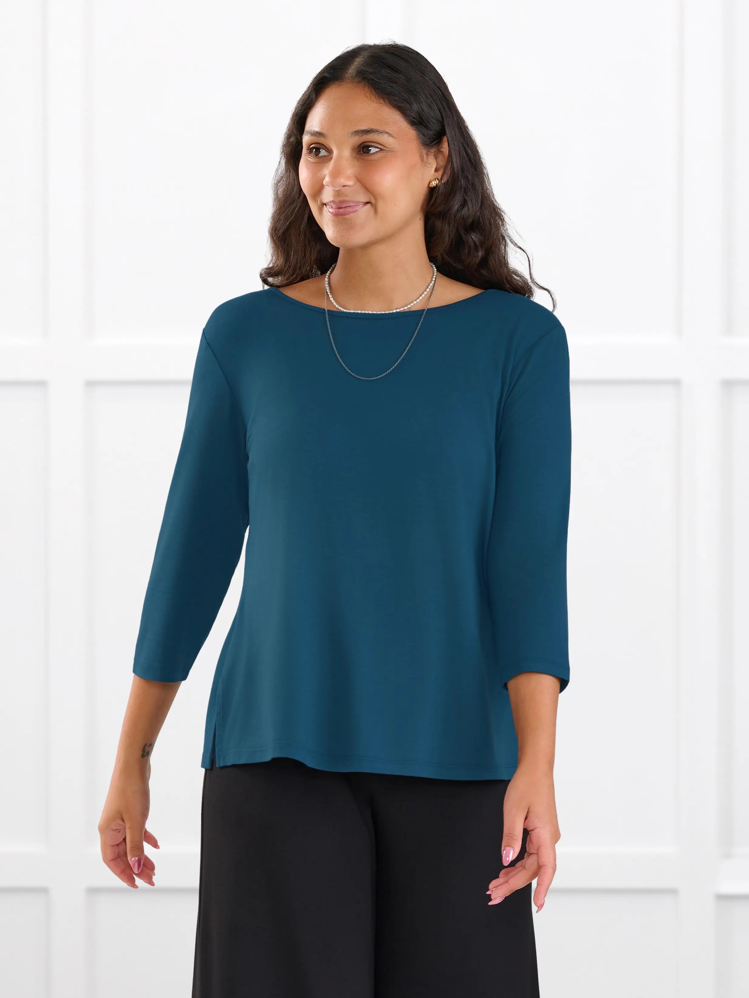 Fran reversible neckline sleeve top for women in Atlantic on model Meron, size XS @Meron-XS 