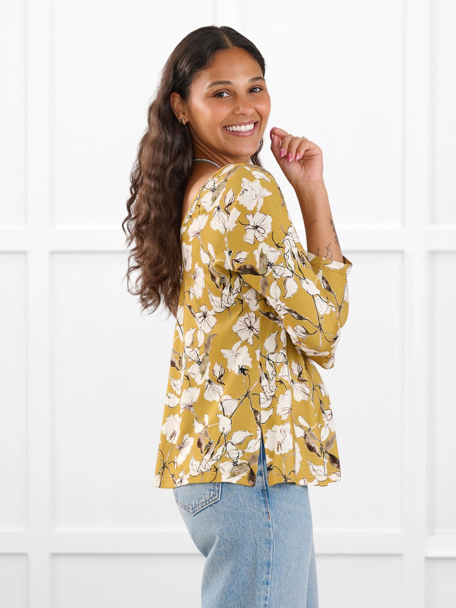 Fran reversible neckline sleeve top for women in Amber bloom on model Meron, size XS @Meron-XS 