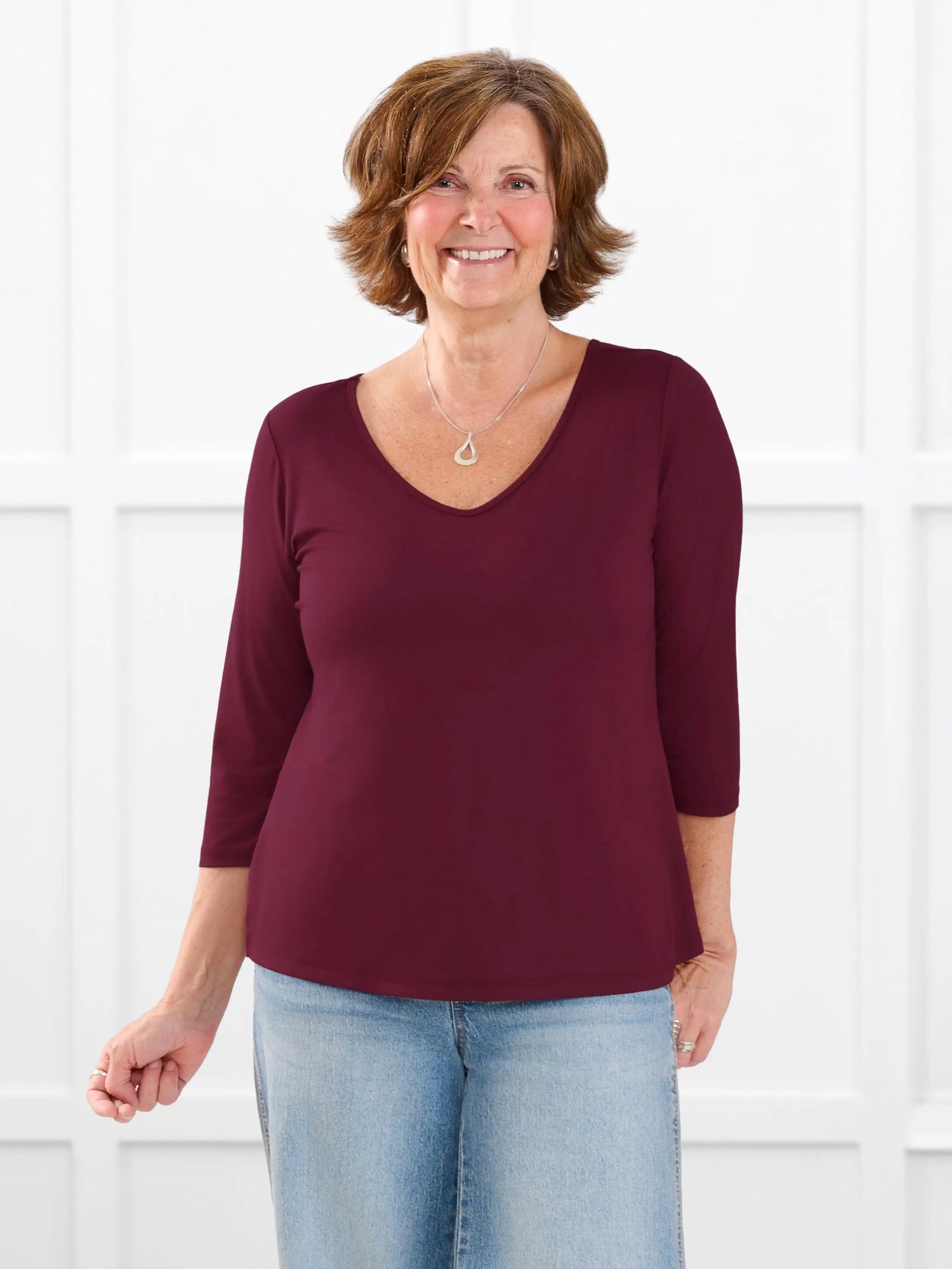 Fran reversible neckline sleeve top for women in Merlot on model Donna, size S @Donna-S 