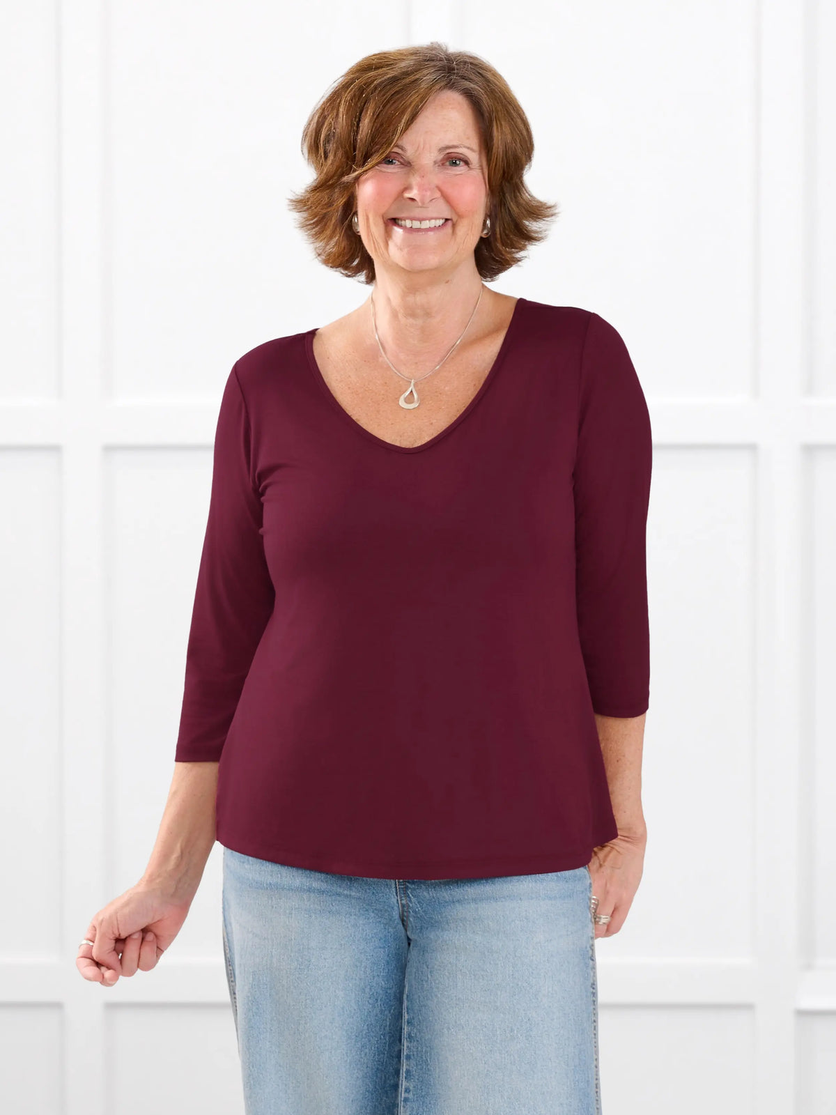 Fran reversible neckline sleeve top for women in Merlot on model Donna, size S @Donna-S 