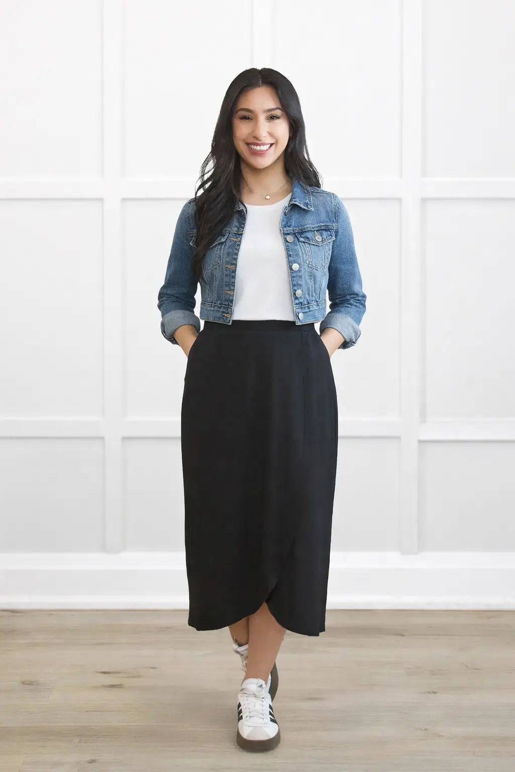 Ginny faux wrap midi skirt for women in Black on model Yasmine, size XS Petite @Yasmine-XS-petite 